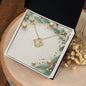 Christmas Background 063 - 18K Yellow Gold Finish Love Knot Necklace