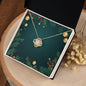 Christmas Background 045 - 18K Yellow Gold Finish Love Knot Necklace