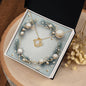 Christmas Background 049 - 18K Yellow Gold Finish Love Knot Necklace