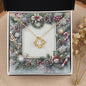 Christmas Background 077 - 18K Yellow Gold Finish Love Knot Necklace