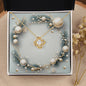 Christmas Background 049 - 18K Yellow Gold Finish Love Knot Necklace