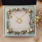 Christmas Background 001 - 18K Yellow Gold Finish Love Knot Necklace