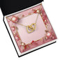 Christmas Background 002 - 18K Yellow Gold Finish Interlocking Hearts Necklace