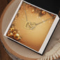 Christmas Background 053 - 18K Yellow Gold Finish Interlocking Hearts Necklace