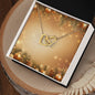 Christmas Background 058 - 18K Yellow Gold Finish Interlocking Hearts Necklace