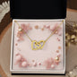 Christmas Background 055 - 18K Yellow Gold Finish Interlocking Hearts Necklace
