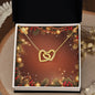 Christmas Background 020 - 18K Yellow Gold Finish Interlocking Hearts Necklace