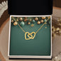 Christmas Background 037 - 18K Yellow Gold Finish Interlocking Hearts Necklace