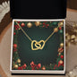 Christmas Background 066 - 18K Yellow Gold Finish Interlocking Hearts Necklace