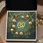 Christmas Background 104 - 18K Yellow Gold Finish Interlocking Hearts Necklace