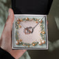 Christmas Background 001 - Interlocking Hearts Necklace