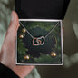 Christmas Background 103 - Interlocking Hearts Necklace