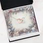 Christmas Background 072 - Interlocking Hearts Necklace
