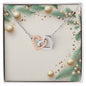Christmas Background 063 - Interlocking Hearts Necklace