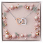 Christmas Background 026 - Interlocking Hearts Necklace