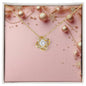 Christmas Background 040 - 18K Yellow Gold Finish Love Knot Necklace
