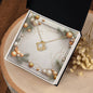 Christmas Background 039 - 18K Yellow Gold Finish Love Knot Necklace