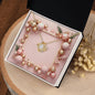 Christmas Background 038 - 18K Yellow Gold Finish Love Knot Necklace