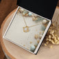 Christmas Background 041 - 18K Yellow Gold Finish Love Knot Necklace