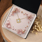 Christmas Background 055 - 18K Yellow Gold Finish Love Knot Necklace