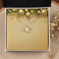 Christmas Background 050 - 18K Yellow Gold Finish Love Knot Necklace