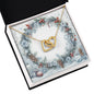 Christmas Background 082 - 18K Yellow Gold Finish Interlocking Hearts Necklace