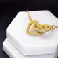 Christmas Background 028 - 18K Yellow Gold Finish Interlocking Hearts Necklace