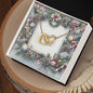 Christmas Background 077 - 18K Yellow Gold Finish Interlocking Hearts Necklace