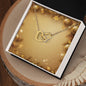 Christmas Background 031 - 18K Yellow Gold Finish Interlocking Hearts Necklace