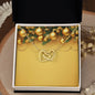Christmas Background 015 - 18K Yellow Gold Finish Interlocking Hearts Necklace