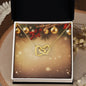 Christmas Background 014 - 18K Yellow Gold Finish Interlocking Hearts Necklace