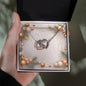 Christmas Background 039 - Interlocking Hearts Necklace