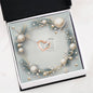 Christmas Background 049 - Interlocking Hearts Necklace
