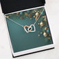 Christmas Background 003 - Interlocking Hearts Necklace