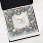 Christmas Background 077 - Interlocking Hearts Necklace