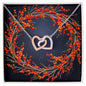Christmas Background 121 - Interlocking Hearts Necklace