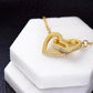 Celebrating 62 Years Anniversary - 18K Yellow Gold Finish Interlocking Hearts Necklace With Mahogany Style Luxury Box